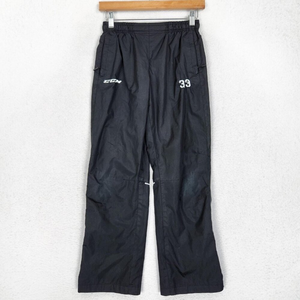 CCM Hockey Track Pants Youth Large Black Warm Up Ankle Zip 33 Logo Polyester